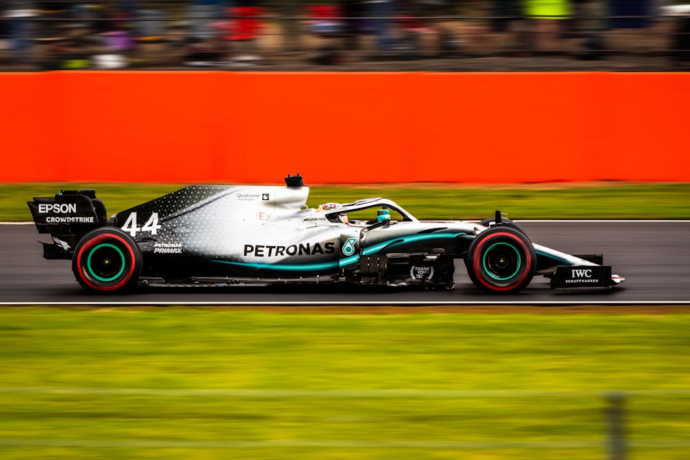 white and gray Petronas racing car
